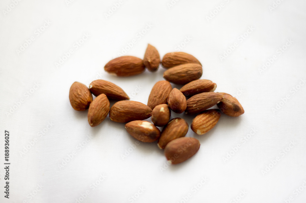 Organic almonds isolated on the white background Organic almonds isolated on the white background