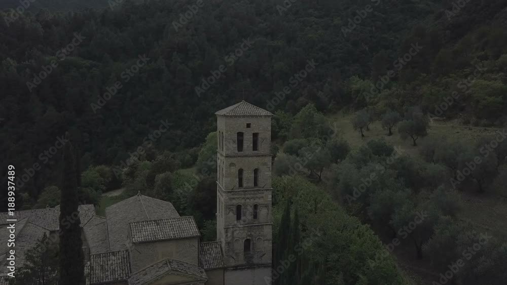 Church spire and roof of an old church in a mountain village Church spire and roof of an old church in a mountain village