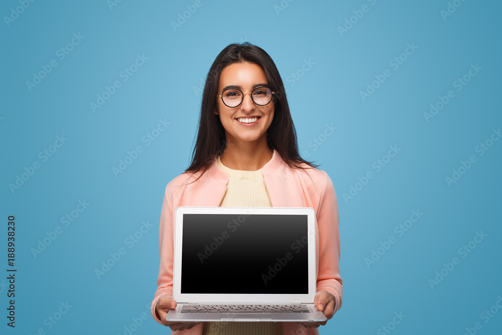 Happy business woman holding laptop Happy business woman holding laptop