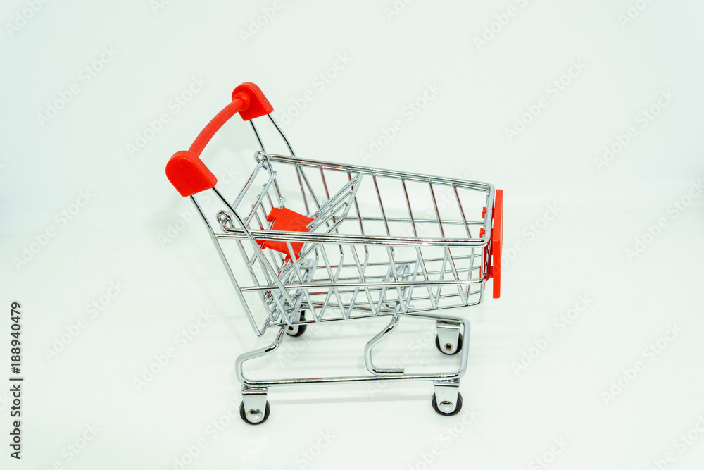 close up of mini shopping cart isolated  on white background.