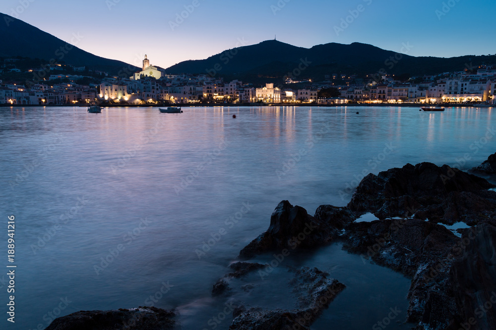 Night time view of Cadaques, scenic town on the Costa Brava, Spain. Long exposure.