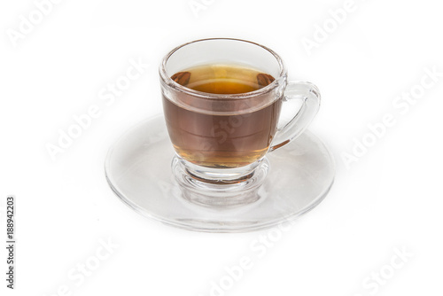 Cup of tea with whole lemon on the white
