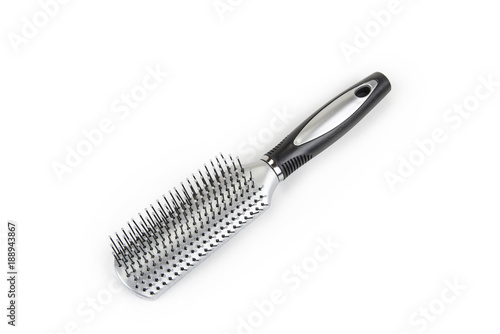 Plastic hairbrush with massage tips on the white background