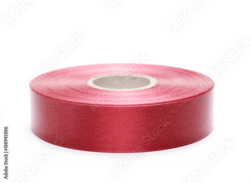 new red ribbon roll isolated on white background
