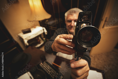 Senior Man Holding Video Camera