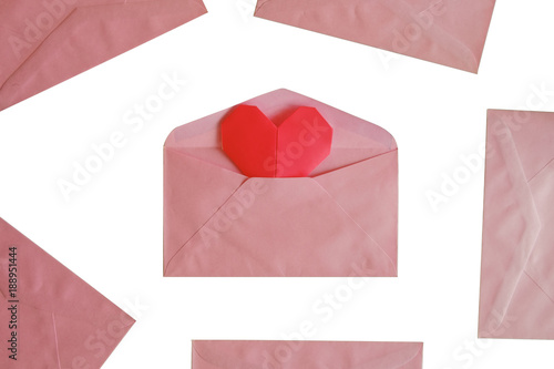 Pink envelope with red hear...