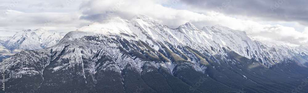 Panorama of majestic snow covered mountain range