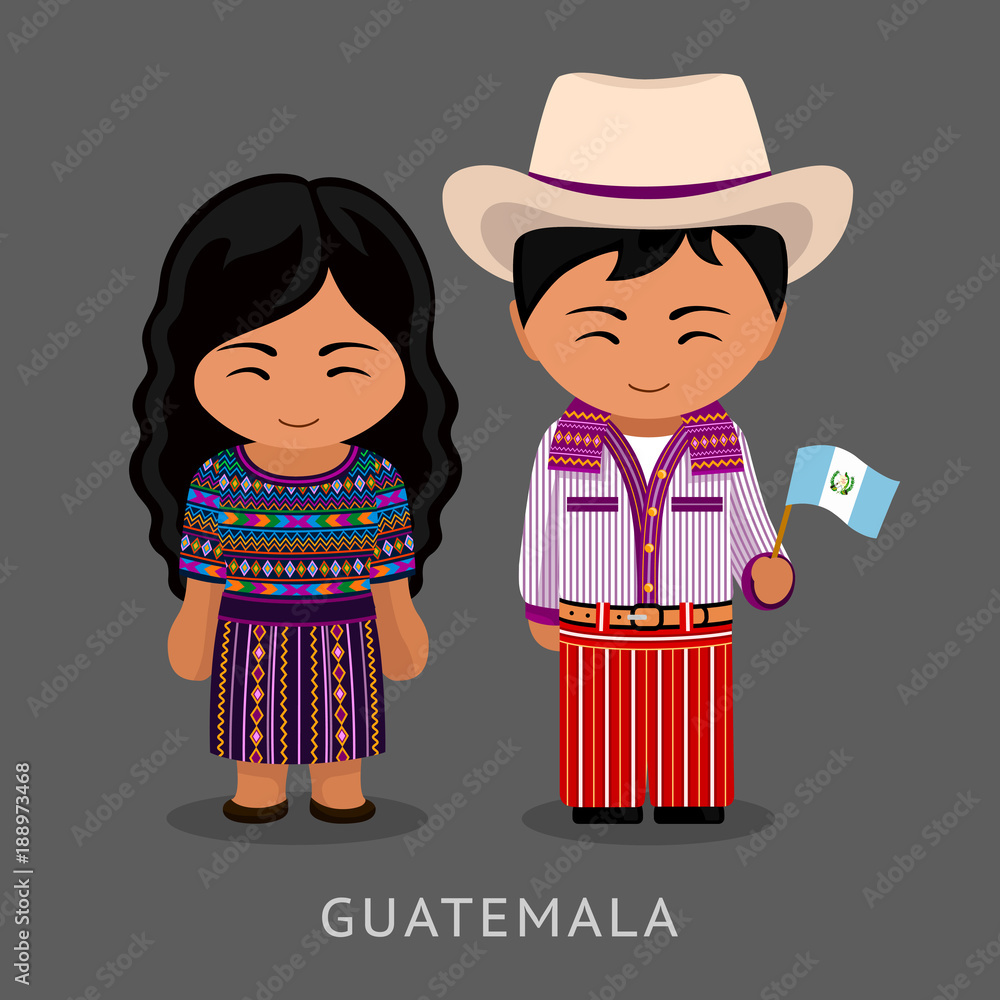 Guatemalans In National Dress With A Flag Man And Woman In Traditional Guatemalans In National Dress With A Flag Man And Woman In Traditional