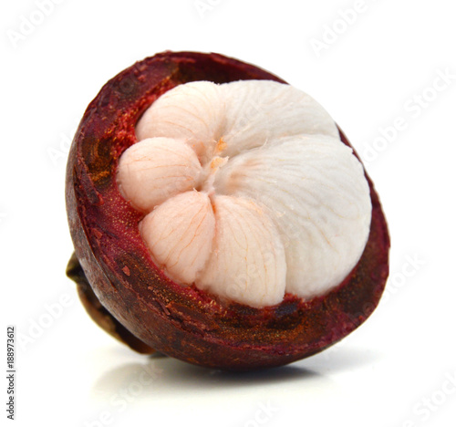 perspective of fresh mangosteen tropical fruit on white background