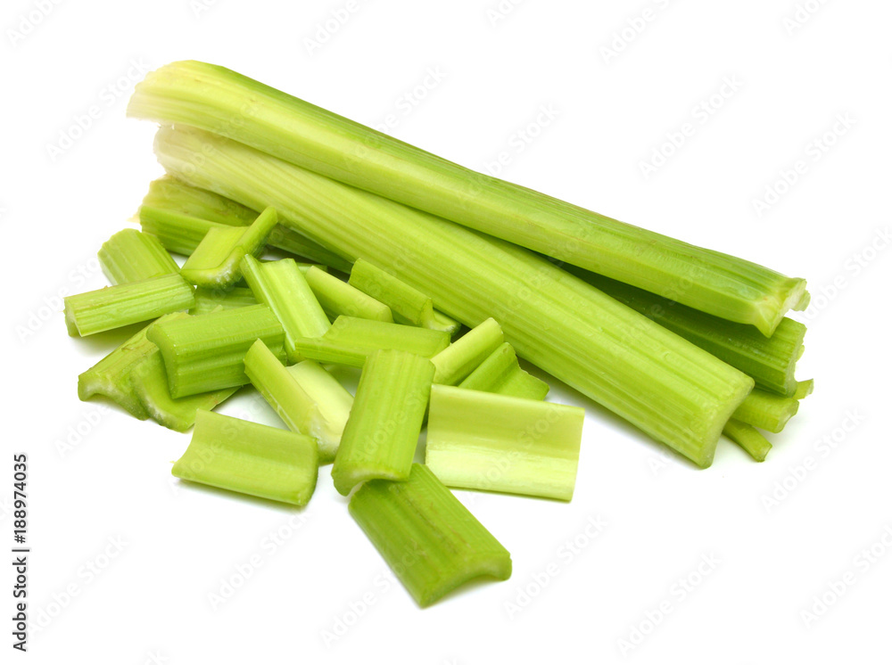 fresh celery stems on a white background fresh celery stems on a white background