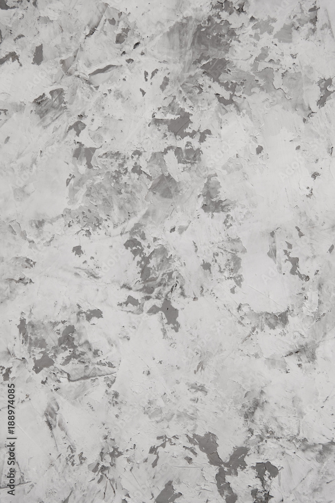 Textured gray background with imitation of concrete made of plaster.