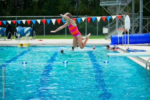 Little Girl Swim Lessons off Diving Board