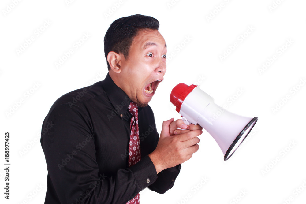 Young Man Shouting with Megaphone, Promotion Concept Young Man Shouting with Megaphone, Promotion Concept