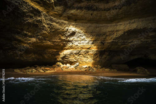 The interior of a sea cave on the Algarve coast near Benagil, Portugal, Europe. Nature geology seen from boat trip.