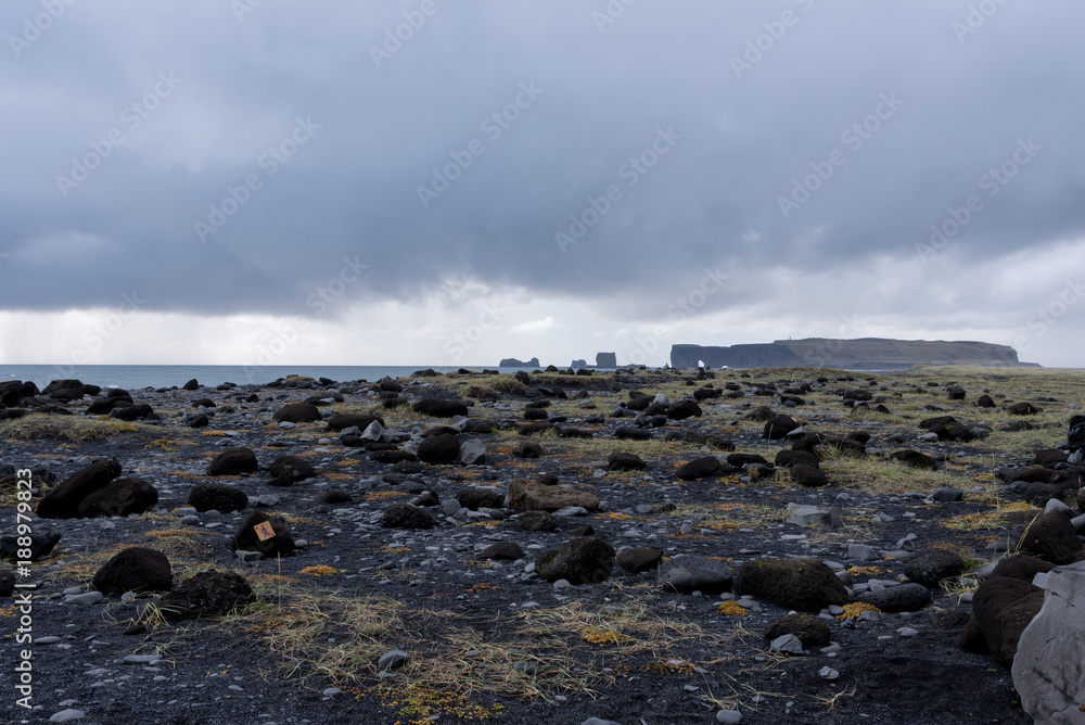 Dyrhólaey cliffs from afar. Dyrhólaey cliffs from afar.