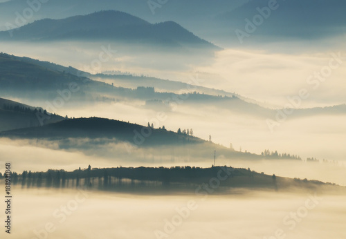 silhouettes of mountains. autumn morning in the Carpathian mountains. foggy dawn