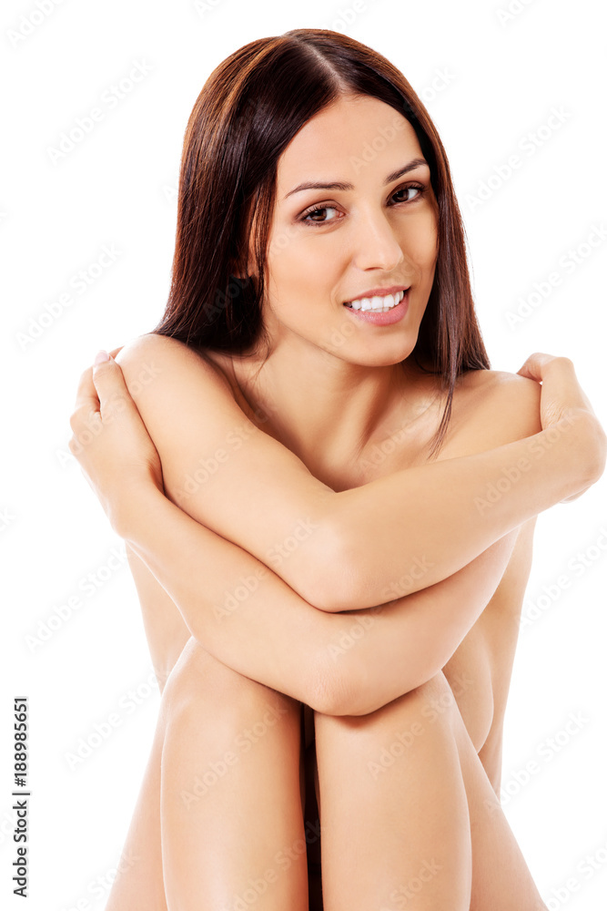 Fototapeta premium Young nude woman sitting on the floor