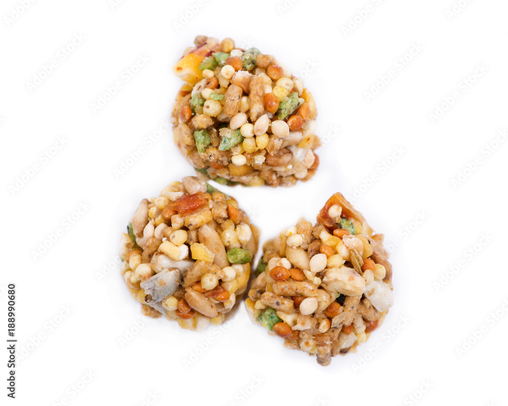 Garden veggie parrot food with carrots, peas and broccoli isolated on white background Garden veggie parrot food with carrots, peas and broccoli isolated on white background
