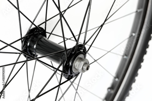Detail of front bicycle wheel, hub and spokes of mountain bike