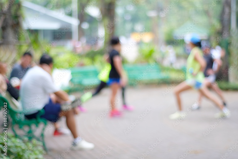 Blurred people and nature, Blur people excerise at park nature background, sport healthy lifestyle, wellbeing Blurred people and nature, Blur people excerise at park nature background, sport healthy lifestyle, wellbeing