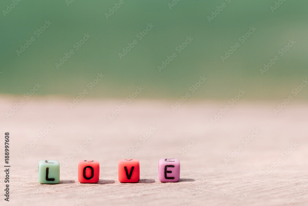 LOVE word on plastic blocks concept of valentine.selective focus LOVE word on plastic blocks concept of valentine.selective focus