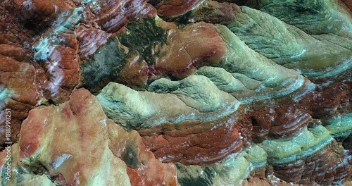 World’s most amazing places. Aerial top down view on the colorful rainbow mountains of Zhangye danxia landform geological park in Gansu province. Part 1 of a 9 part series-can be merged to 1 continuou