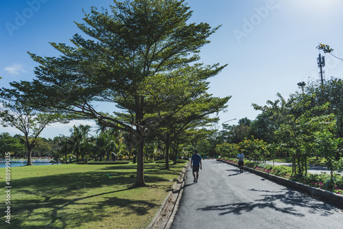 Photography People runing in the SUANLUANG RAMA IX garden at the morning.