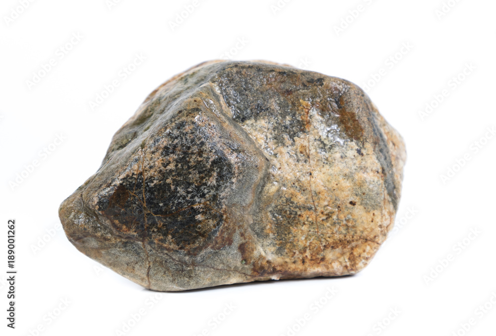 Single natural stone on white background, close-up Single natural stone on white background, close-up