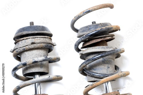 Old, dirty shock absorber, car suspension parts