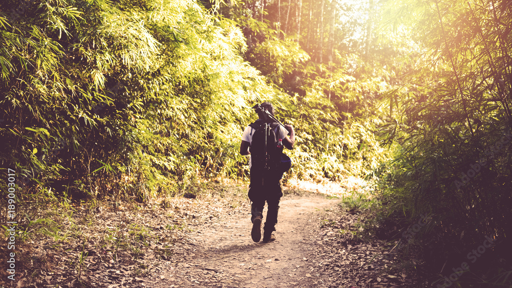 Photographer asian man Traveling photograph Nature. travel relax in the holiday walk in the forest. travel relax in the holiday. Thailand Photographer asian man Traveling photograph Nature. travel relax in the holiday walk in the forest. travel relax in the holiday. Thailand