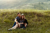 guy and girl are resting in the mountains, travel, camping, Valentine's, Europe, in love