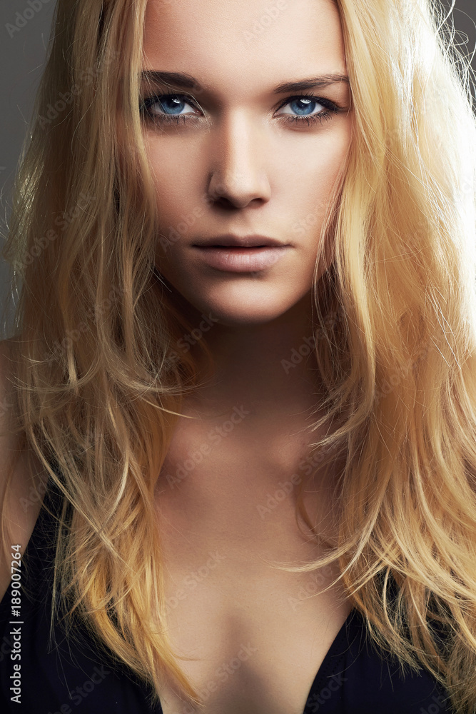Naklejka premium Young blond woman.Beautiful blonde Girl