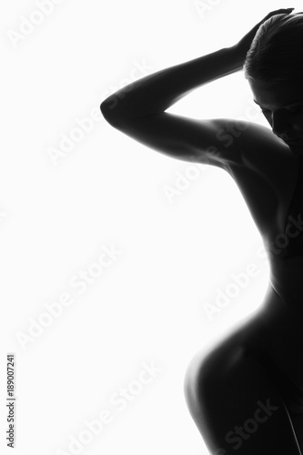 black and white portrait. female nude silhouette