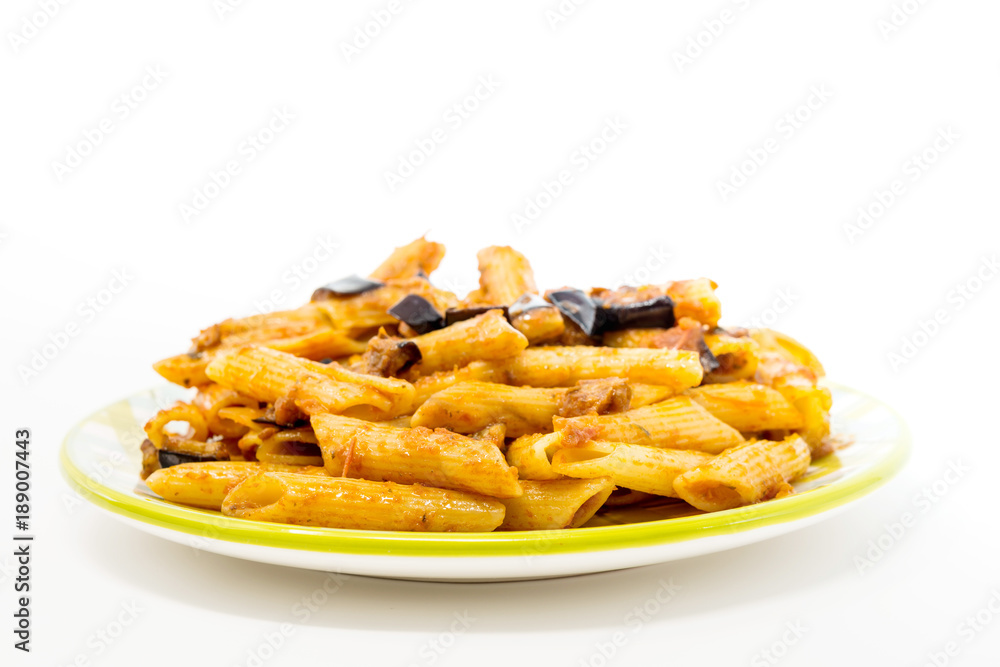Spaghetti with aubergine and tomato sauce on a the table Spaghetti with aubergine and tomato sauce on a the table
