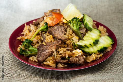 Homemade Chinese fried rice with vegetables and beef