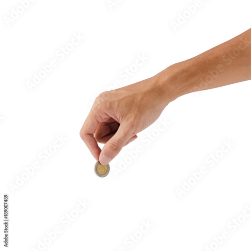 Female hand holding coin isolated on white background with clipping path.