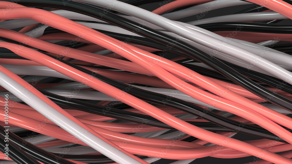 Twisted black, white and red cables and wires on black surface Twisted black, white and red cables and wires on black surface