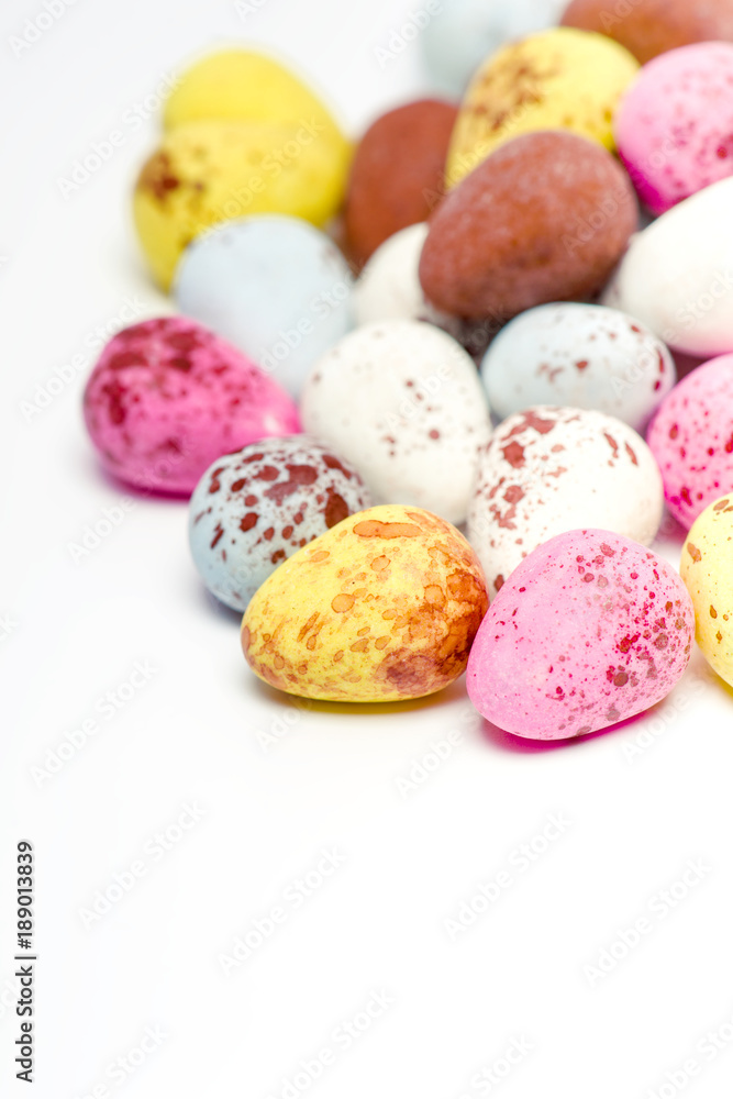 chocolate covered with icing sugar isolated on plain background chocolate covered with icing sugar isolated on plain background