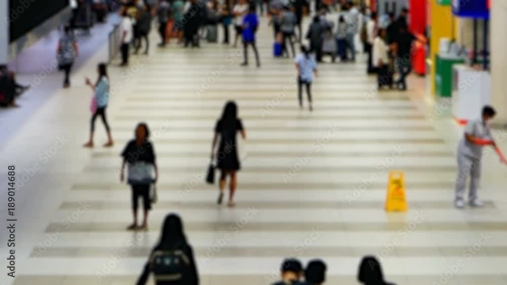 Time lapse passengers in airport, motion blur 