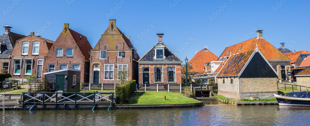 Panorama of historic houses at a canal in Hindeloopen