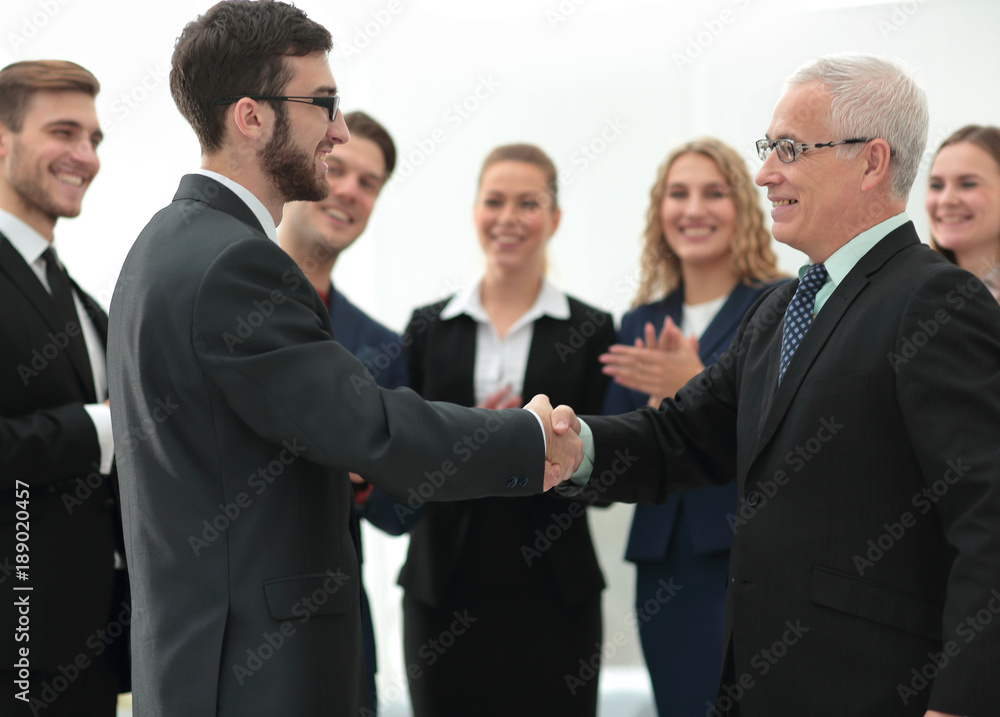 Business handshake and business people conce Business handshake and business people conce