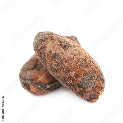 Few cocoa beans isolated