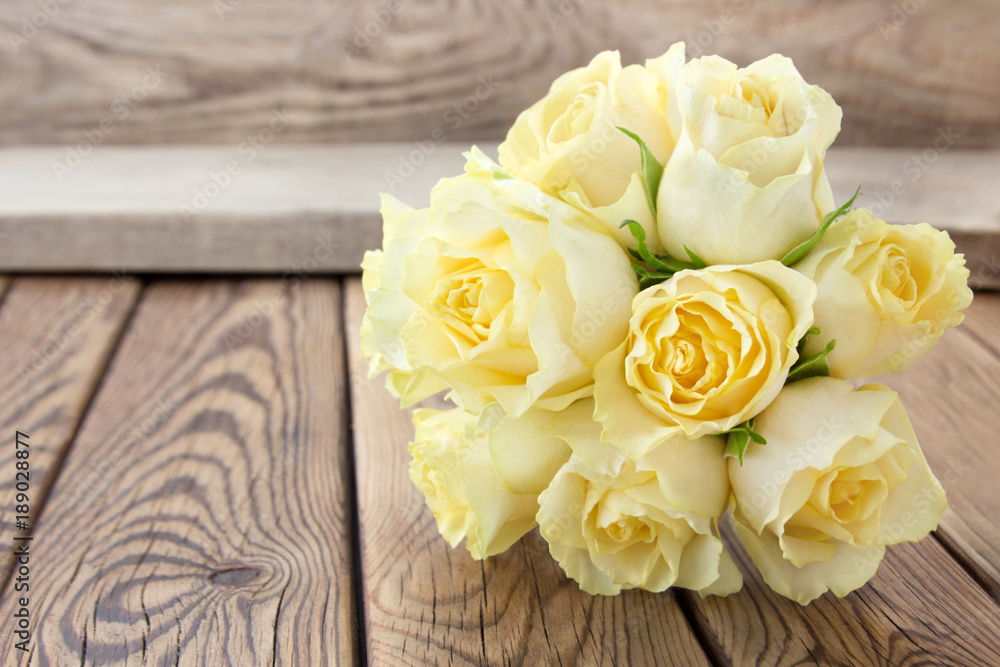 Roses and wooden background Roses and wooden background