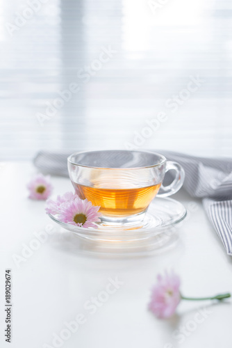 Cup of tea on the windowsill. Tea time.