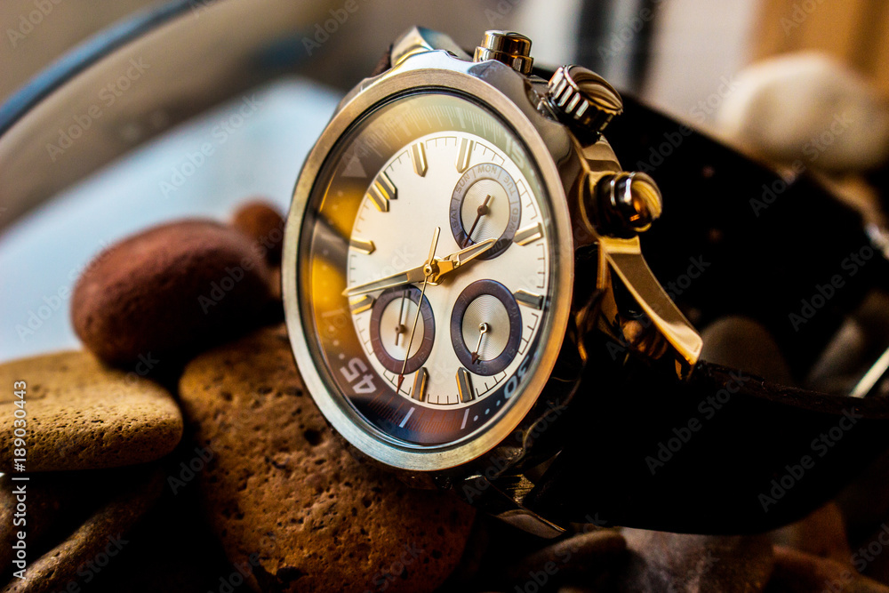 Fototapeta premium Luxury wrist man watch with leather strap showing time