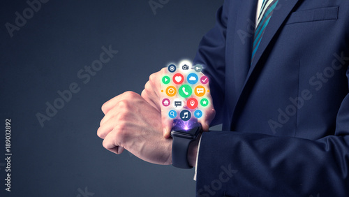 Businessman wearing smartwatch.