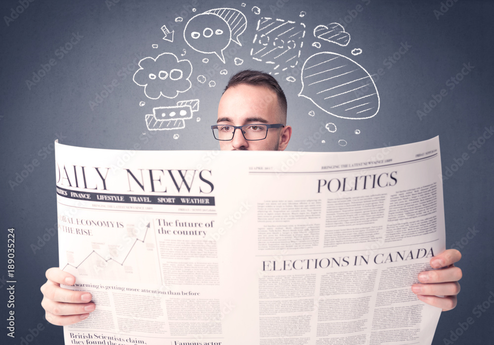 Businessman reading newspaper Businessman reading newspaper