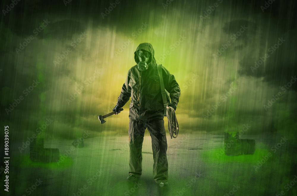 Fototapeta premium Guard in an abandoned space after explosion