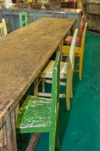 Wooden Table Top and Colorful Vintage Chairs Indoor