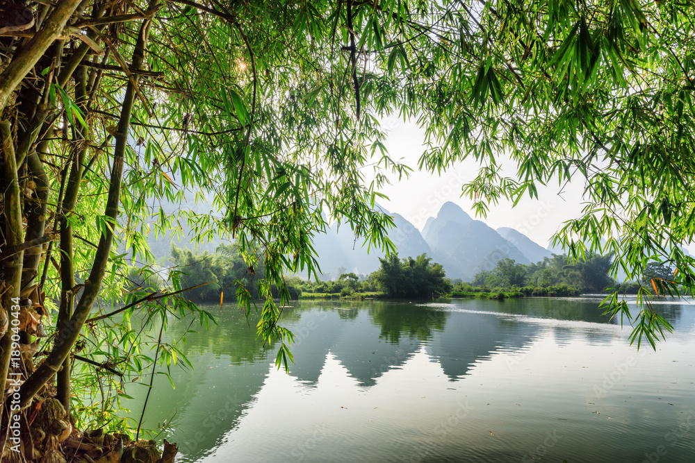 Scenic view of the Yulong River at Yangshuo, Guilin, China - obrazy, fototapety, plakaty 